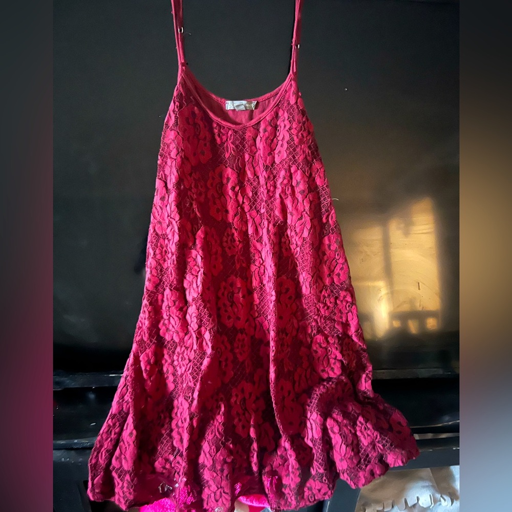 Women’s “baby doll” lace dress with spaghetti straps. Dress up  or down!